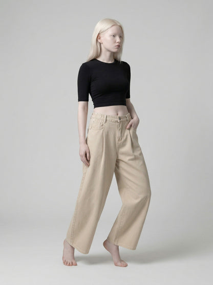 DAXUEN Beige high-waisted wide leg trousers — model photo