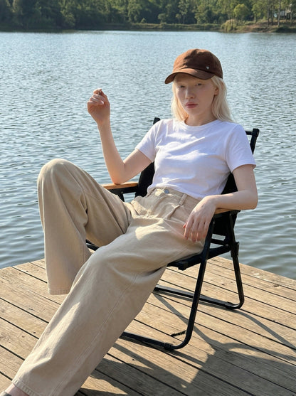 DAXUEN Beige high-waisted wide leg trousers — model photo