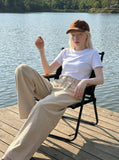 DAXUEN Beige high-waisted wide leg trousers — model photo
