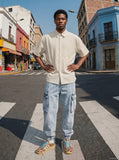 DAXUEN Beige oversized short-sleeve button-up shirt — model photo