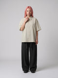 DAXUEN Beige oversized short-sleeve button-up shirt — model photo