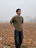 DAXUEN black and olive contrast stitch Henley top — model photo
