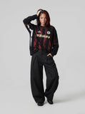 DAXUEN black barrel-cut wide-leg trousers — model photo