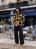 DAXUEN black wide-leg cargo pants with embroidered flag and studs — model photo