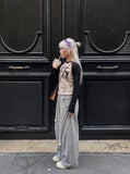 DAXUEN beige waffle knit long sleeve top with black collage graphics — model photo