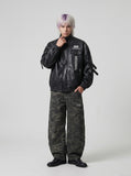 DAXUEN black crocodile-embossed faux leather jacket — model photo