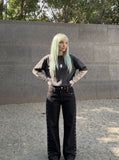 DAXUEN black wide-leg jeans with stud embellishments and star patches — model photo