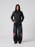DAXUEN black faux leather jacket with embossed buttons — model photo