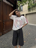 DAXUEN black wide-leg striped capri pants — model photo