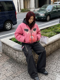DAXUEN black wide-leg cargo pants with embroidered flag patch — model photo