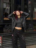 DAXUEN black wide-leg cargo pants with embroidered flag patch — model photo