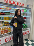 DAXUEN black wide-leg denim jeans with unique closure — model photo