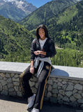 DAXUEN black wide-leg sweatpants with yellow stripes — model photo