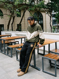 DAXUEN black wide-leg sweatpants with yellow stripes — model photo