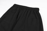 DAXUEN black wide-leg track pants with embroidered crest