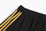 DAXUEN black wide-leg track pants with embroidered crest