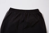 DAXUEN black wide-leg track pants with dark grey curved panels