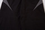 DAXUEN black wide-leg track pants with dark grey curved panels