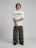 DAXUEN Oversized BLACKENERGY graphic t-shirt — model photo