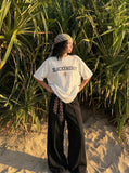 DAXUEN Oversized BLACKENERGY graphic t-shirt — model photo