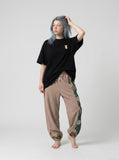 DAXUEN Oversized Apple Core Graphic Tee — model photo