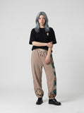 DAXUEN Oversized Apple Core Graphic Tee — model photo