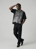DAXUEN Oversized short-sleeved graphic T-shirt in black or white — model photo