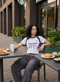 DAXUEN Short sleeve athletic top with color blocking — model photo