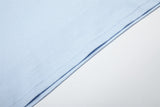 DAXUEN light blue long-sleeve t-shirt with blocky '06' graphic