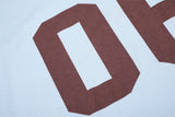 DAXUEN light blue long-sleeve t-shirt with blocky '06' graphic