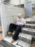 DAXUEN Oversized Bold Lettering Graphic Tee — model photo