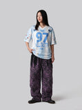 DAXUEN white and light blue striped oversized jersey tee with graphic — model photo