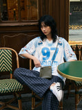 DAXUEN white and light blue striped oversized jersey tee with graphic — model photo
