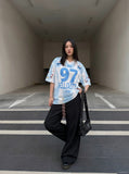 DAXUEN white and light blue striped oversized jersey tee with graphic — model photo