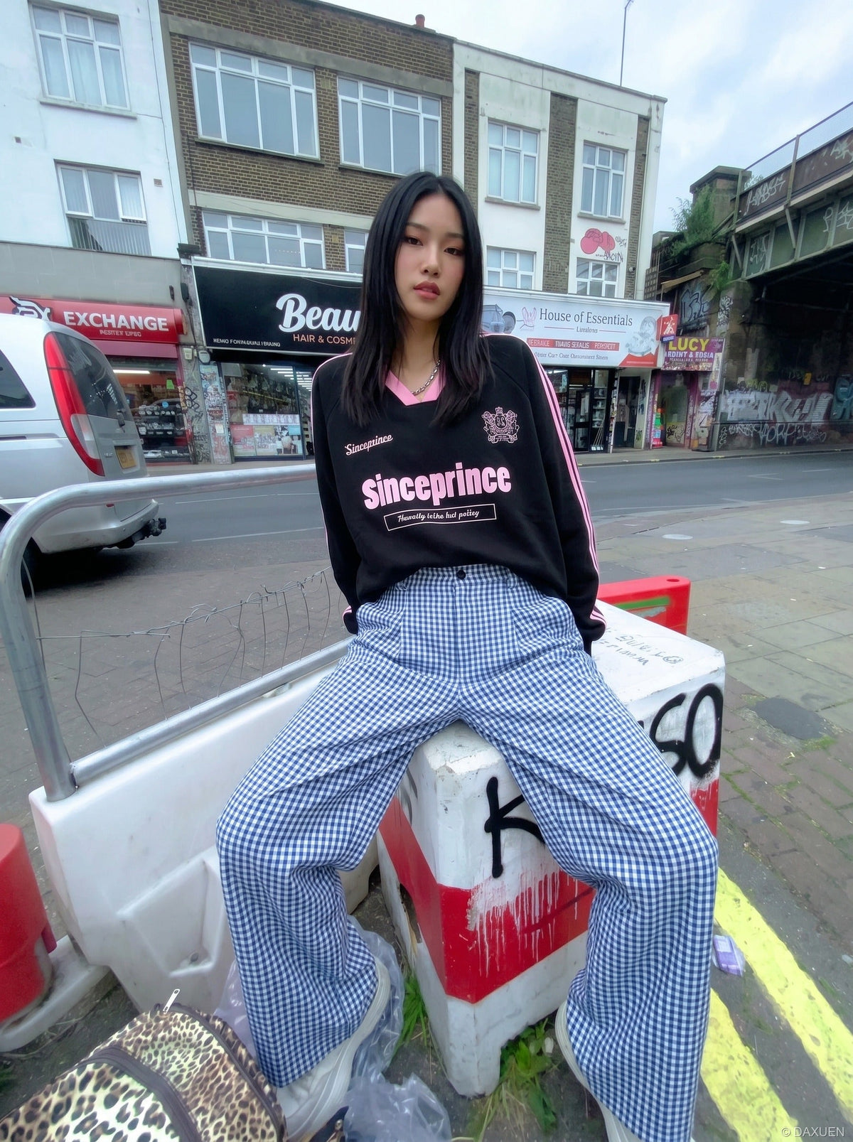 DAXUEN Blue and white wide-leg trousers with gingham pattern — model photo