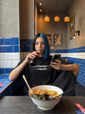 DAXUEN black oversized blurred-line graphic t-shirt — model photo