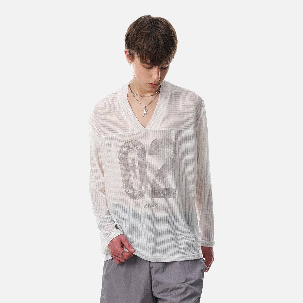 DAXUEN Long-sleeved V-neck top with graphic prints