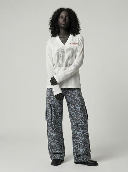 DAXUEN Long-sleeved V-neck top with graphic prints — model photo