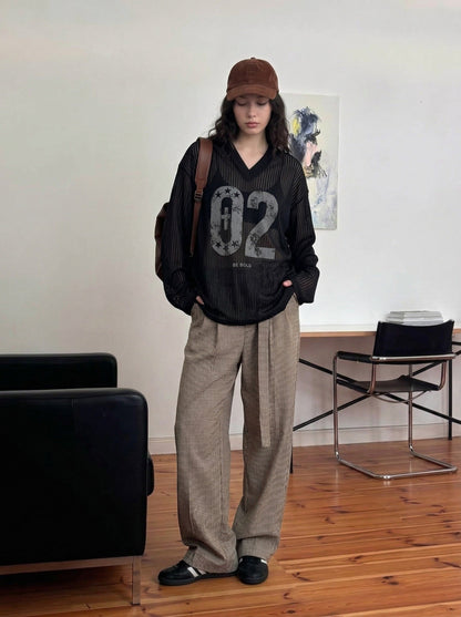 DAXUEN Long-sleeved V-neck top with graphic prints — model photo