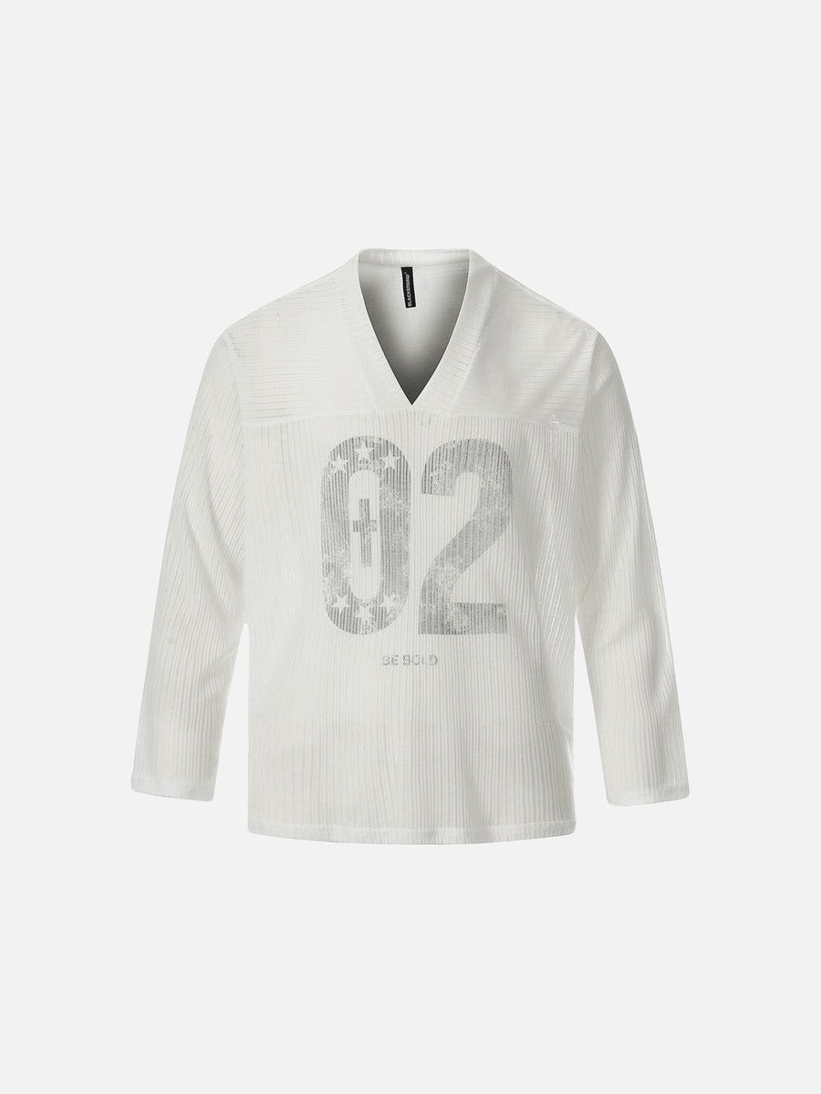DAXUEN Long-sleeved V-neck top with graphic prints