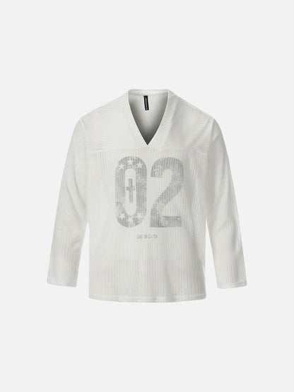 DAXUEN Long-sleeved V-neck top with graphic prints