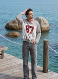 DAXUEN grey and black long-sleeve top with flame graphic — model photo
