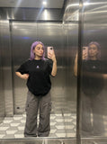 DAXUEN black oversized abstract three-part graphic tee — model photo