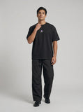 DAXUEN black oversized abstract three-part graphic tee — model photo