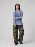 DAXUEN white oversized animated-characters graphic long-sleeve tee — model photo