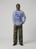 DAXUEN white oversized animated-characters graphic long-sleeve tee — model photo
