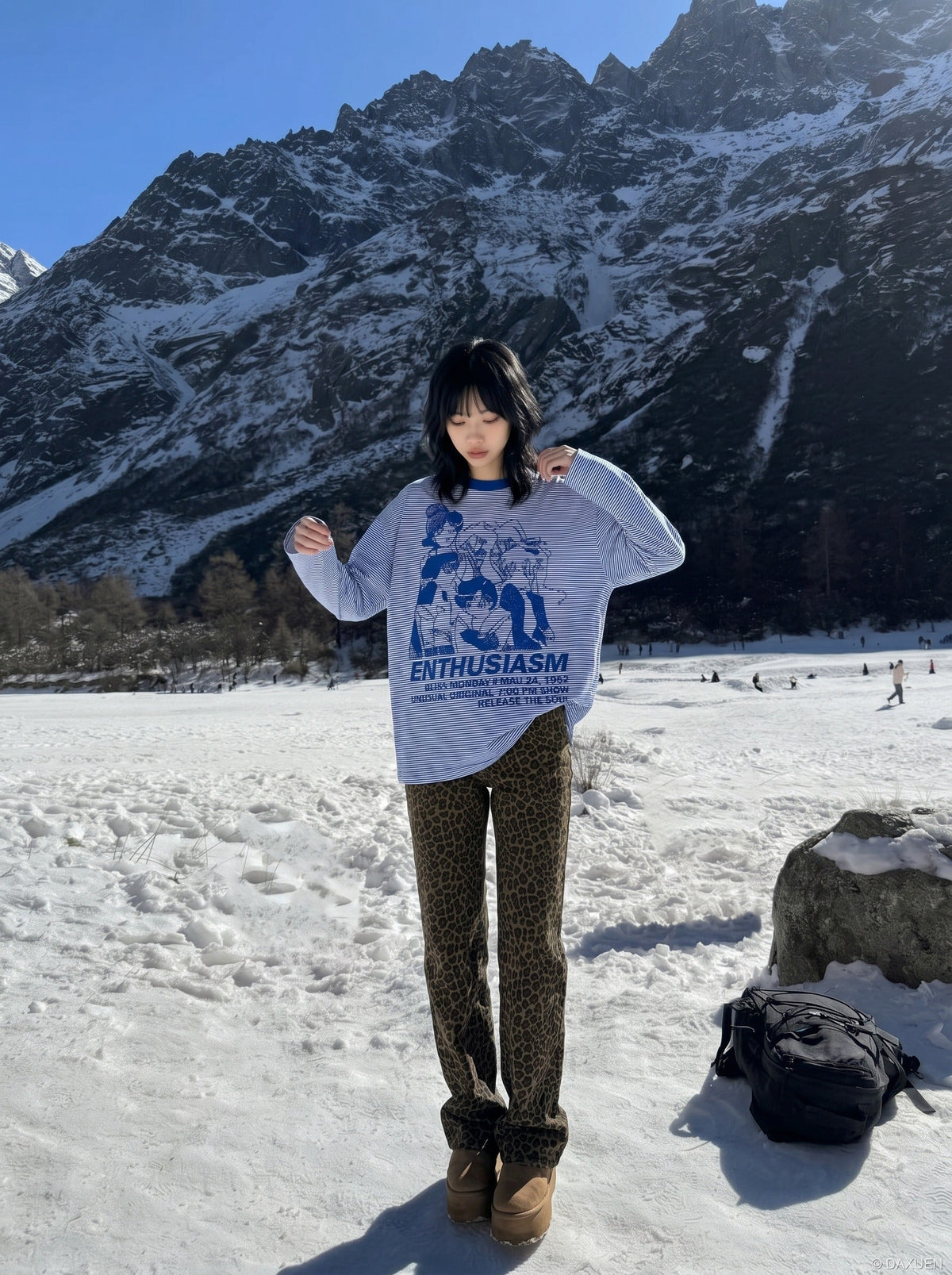 DAXUEN white oversized animated-characters graphic long-sleeve tee — model photo