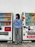 DAXUEN white oversized animated-characters graphic long-sleeve tee — model photo