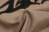 DAXUEN light brown and black bold graphic long-sleeve top