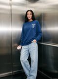 DAXUEN dark blue bold back graphic long-sleeved crew top — model photo